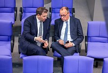 Lars Klingbeil und Friedrich Merz - Michael Kappeler/dpa