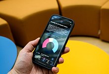 Depot abgebildet auf Smartphone - Zacharie Scheurer/dpa-tmn