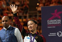 Emotionaler Abschied: Kim Bui nach der Siegerehrung in München. - Soeren Stache/dpa