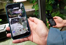 Augmented Reality im K&ouml;lner Zoo - Foto: Henning Kaiser/dpa