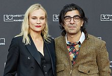 Diane Kruger und Fatih Akin auf dem Roten Teppich im Cinemaxx Hamburg. - Georg Wendt/dpa