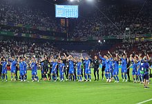 Slowenien - Jubel - Rolf Vennenbernd/dpa