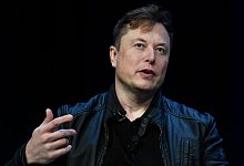 Elon Musk hat sich für seinen angestrebten 44 Milliarden Dollar teuren Twitter-Kauf zusätzliche Mittel von Investoren wie dem Oracle-Mitgründer Larry Ellison gesichert. - Susan Walsh/AP/dpa