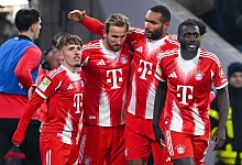 Dayot Upamecano und Harry Kane - Sven Hoppe/dpa