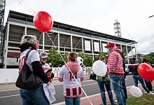 K&ouml;ln-Fans - Foto: Marius Becker/dpa