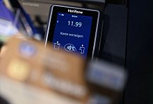Bargeldlos Bezahlen im Einzelhandel - Bernd Weißbrod/dpa