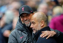 Jürgen Klopp (l) und Pep Guardiola - Jon Super/AP/dpa