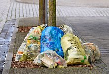 Müll am Straßenrand - Soeren Stache/dpa