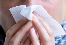 Schnupfen, Husten und Corona - Maurizio Gambarini/dpa