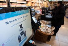 SB-Kasse - Swen Pförtner/dpa