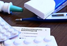 Eine ärztliche Arbeitsunfähigkeitsbescheinigung - Bernd Weißbrod/dpa/dpa-tmn
