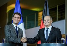 Olaf Scholz und Gabriel Attal - Kay Nietfeld/dpa