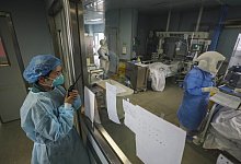 Coronavirus - Foto: Uncredited/CHINATOPIX/AP/dpa