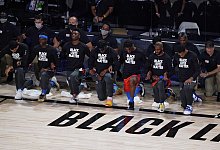 Schröder-Team - Foto: Ashley Landis/Pool AP/dpa