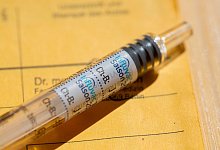 Grippeimpfung im Impfpass - Fernando Gutierrez-Juarez/dpa