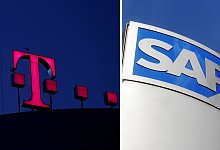 Telekom und SAP - Foto: Oliver Berg/dpa