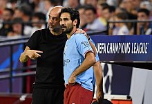 Pep Guardiola (l) und Ilkay G&uuml;ndogan - Jose Breton/AP/dpa