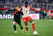 Alphonso Davies - Lukas Barth/dpa
