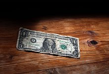 Abgenutzter Ein-Dollar-Schein - Karl-Josef Hildenbrand/dpa