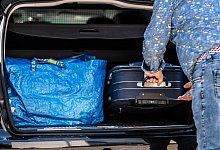 Gepackte Koffer - Foto: Guido Kirchner/dpa