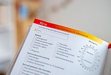 Zahn&auml;rztliches Untersuchungsheft im U-Heft &uuml;r Kinder - Zacharie Scheurer/dpa-tmn