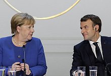 Merkel und Macron - Foto: Ludovic Marin/AFP Pool/AP/dpa