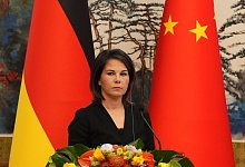 Außenministerin Baerbock besucht China - Soeren Stache/dpa