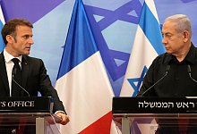 Frankreichs Macron und Israels Netanjahu - Christophe Ena/AP/dpa