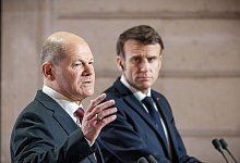 Olaf Scholz und Emmanuel Macron - Michael Kappeler/dpa