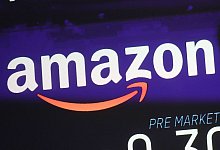 Amazon - Mark Lennihan/AP