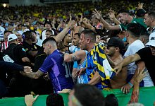 Ausschreitungen - Silvia Izquierdo/AP/dpa