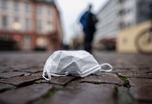 Maske - Foto: Frank Rumpenhorst/dpa