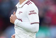 «Visit Ruanda» auf einem Arsenal Trikot - Jon Super/AP/dpa