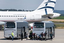Fl&uuml;chtlinge - Foto: Swen Pf&ouml;rtner/dpa