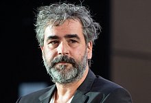 Deniz Yücel berichtete als Zeuge, er habe insgesamt fünf Drohmails erhalten (Archivbild). - Swen Pförtner/dpa