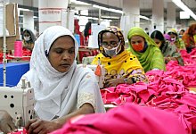 Näherinnen - Foto: Doreen Fiedler/picture alliance/dpa