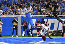 Lions-Receiver Amon-Ra St. Brown (l) erzielte gegen Washington zwei Touchdowns. - Lon Horwedel/FR170538 AP/dpa