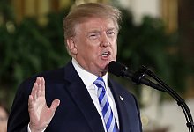 Trump erwartet Festnahme am Dienstag und fordert Proteste - Evan Vucci