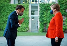 Treffen Merkel und Macron - Foto: Kay Nietfeld/dpa