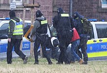 Mutma&szlig;liche Mitglieder einer syrischen Miliz festgenommen - Uli Deck/dpa