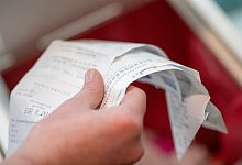 Kassenbons entsorgen - Andrea Warnecke/dpa-tmn