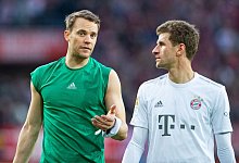 Identifikationsfiguren, die dem FC Bayern nach Klaus Augenthaler lange erhalten bleiben sollten: Manuel Neuer (l) und Thomas Müller. - Guido Kirchner/dpa
