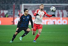 Zweikampf - Sven Hoppe/dpa