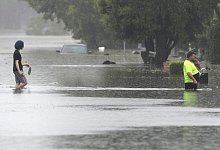 &Uuml;berflutete Stra&szlig;en - Foto: Rick Rycroft/AP/dpa