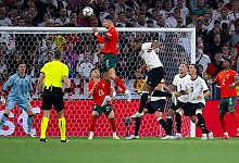 Cristiano Ronaldo (M) - Sven Hoppe/dpa