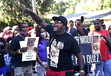 Demonstration in Georgia - Foto: Bobby Haven/The Brunswick News via AP/dpa