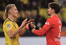 Abklatschen - Bernd Thissen/dpa