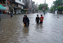 Der Monsun bringt in Pakistan starke Regenf&auml;lle mit sich. - K.M. Chaudary/AP/dpa
