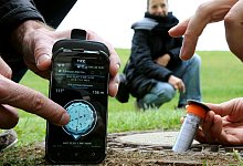 Geocaching - Foto: Ingo Wagner/dpa