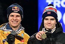 Andreas Wellinger und Marius Lindvik. - Hendrik Schmidt/dpa